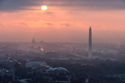A photograph of Washington DC during a foggy sunset